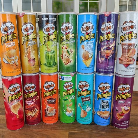 many different flavors of pringles are stacked on top of each other