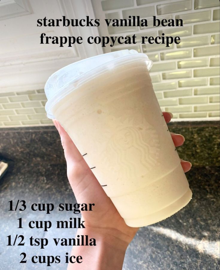 a hand holding a cup with instructions for how to make starbucks vanilla bean frappe copycat recipe