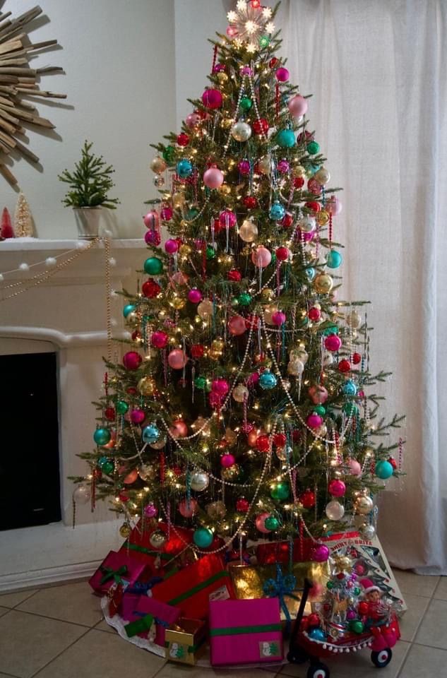 a decorated christmas tree in a living room