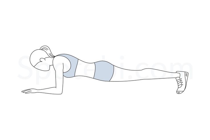 a woman doing push ups on her stomach with the help of a hand held exercise