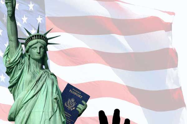 the statue of liberty holding a passport in front of an american flag