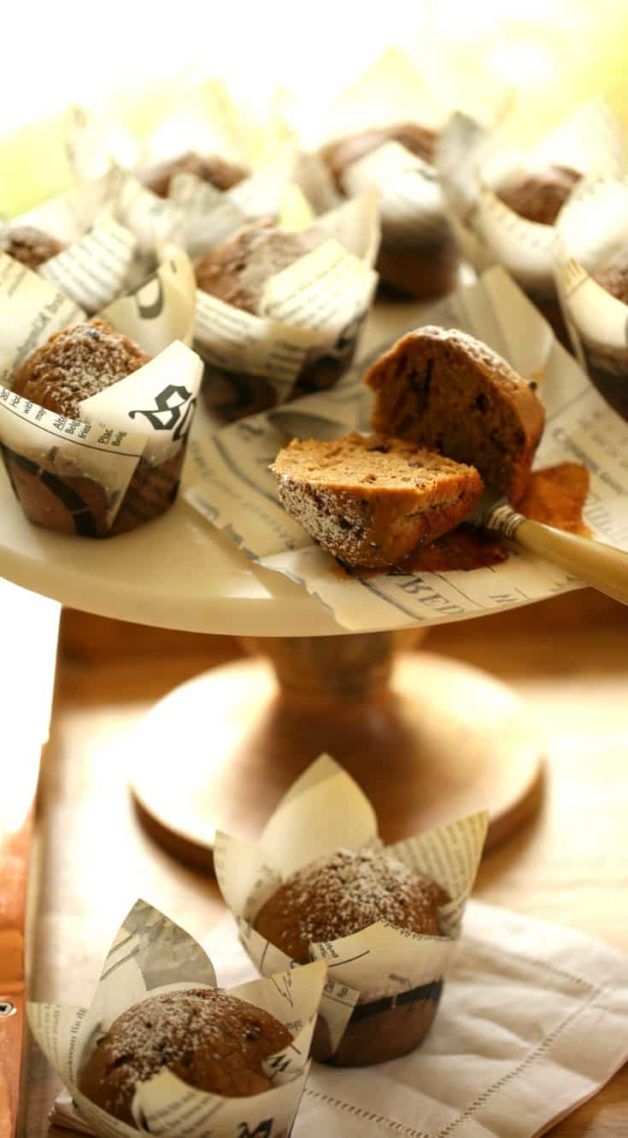 some pastries sitting on top of a cake plate