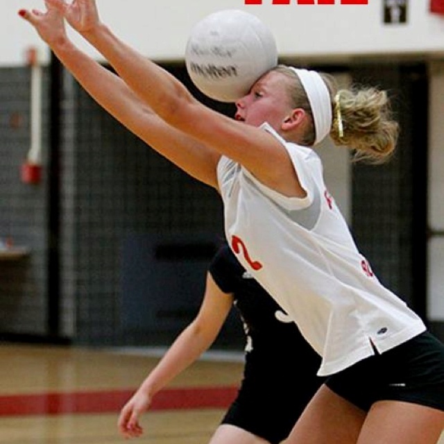 a woman reaching up to hit a volleyball with the caption fail on her face