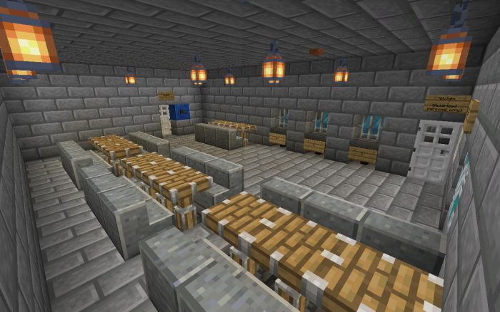 an empty room with benches and tables in the center, some are made out of blocks