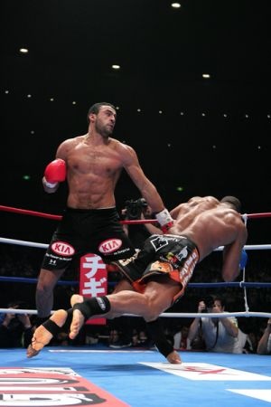 two men in the middle of a boxing match