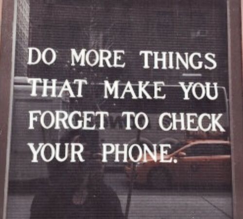 a sign that says do more things that make you forget to check your phone