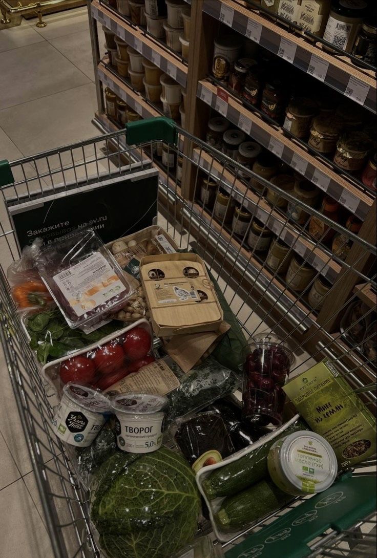 a shopping cart filled with lots of food