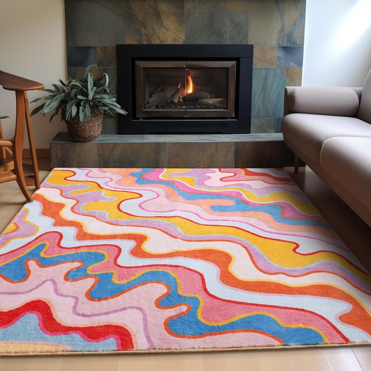 a living room with a fire place in the fireplace and rugs on the floor