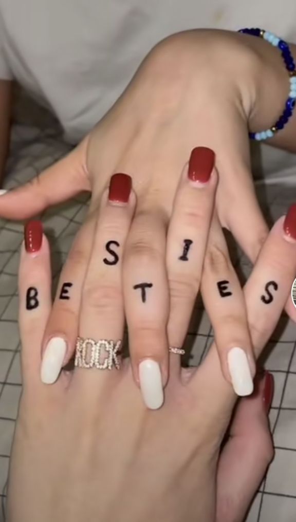 two people with manies on their hands holding each other's fingers and saying besties