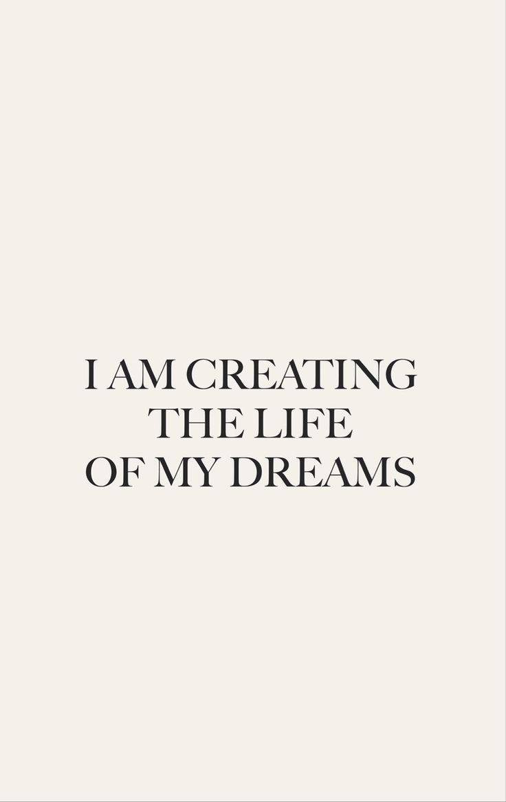 the words i am creating the life of my dreams written in black on a white background