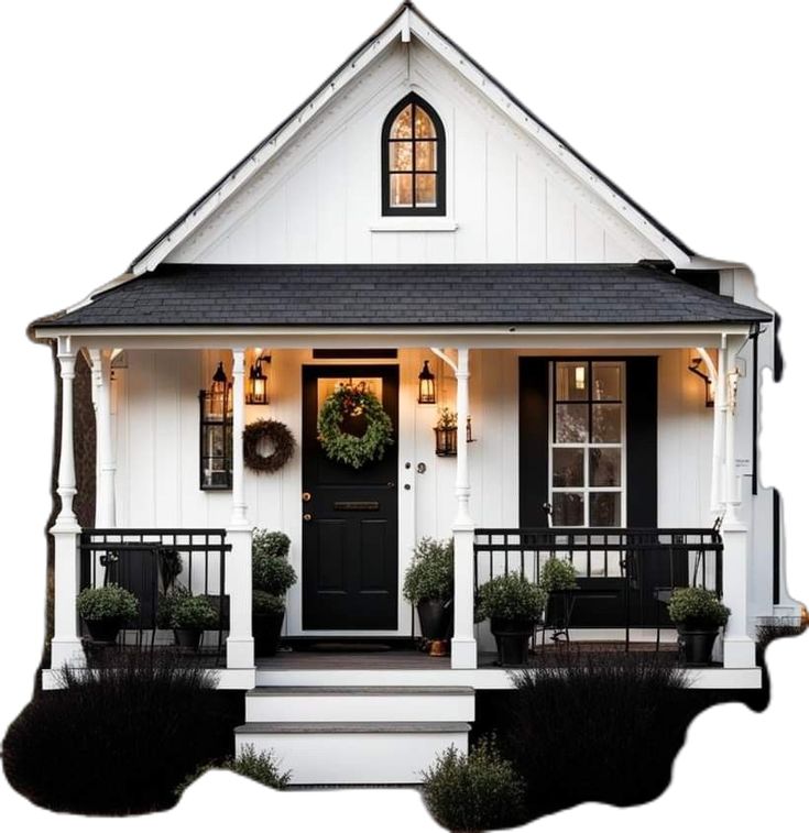 a white house with black shutters and front porch