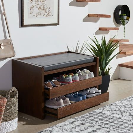 there is a shoe rack with many pairs of shoes in it