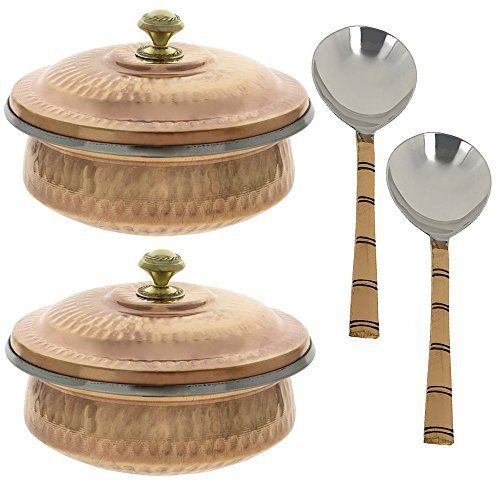 a set of three pots and spoons with wooden handles