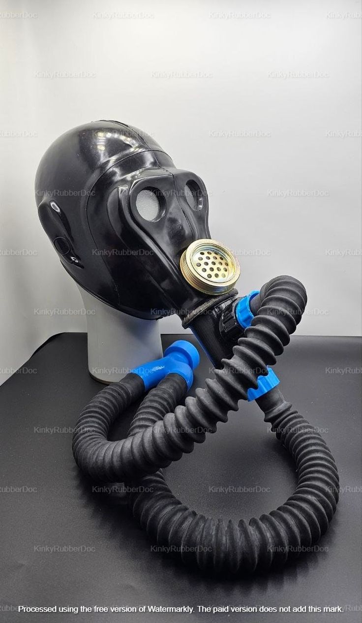 The unique upgraded rubber gas mask sets. Choose your complete set of options. This gas mask gives an exciting look that suits parties or any fun activities. The mask goes well with any latex catsuit or bodysuit. Note: the color of some connectors may be other than black/blue, depending on stock. If you want the exact color (only black, or some yellow elements, red, etc) PLEASE, contact us in advance. Options: Currently, we offer three packs: Basic:  - Mask - 1pc  - Breathing resistance valve (BRV) SMALL - 1pc - Rubber hose 42" (106.7cm) - 1 pc  - Blind eye covers - 2 pcs - Carbon filter canister - 1pc - GIFT Merch Caring Bag - 1 pc Advanced:  - Mask - 1pc - Breathing resistance valve (BRV) SMALL - 1pc - Rubber hose 42" (106.7cm) - 1 pc  - Blind eye covers - 2 pcs - Breathing resistance va Vintage Gas Mask, Military Suit, Creepy Masks, Gas Hose, Rubber Hose, Blind Eyes, Eye Cover, Full Face Mask, Gas Mask