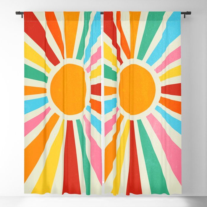 the sun is shining brightly in this colorful curtain