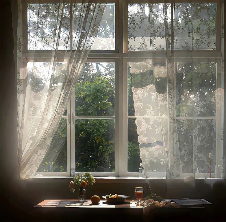 the sun shines through two windows on a table with food and drinks in front of it