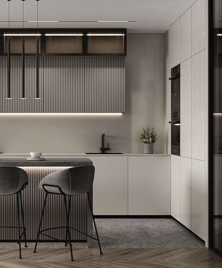 an image of a modern kitchen setting with bar stools in the center and countertop