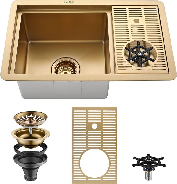 kitchen sink with drain, strainer and grate for draining dishes in gold color