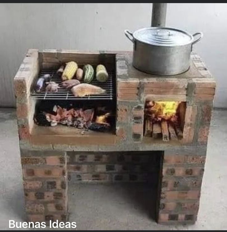 an outdoor grill made out of bricks with food cooking on it