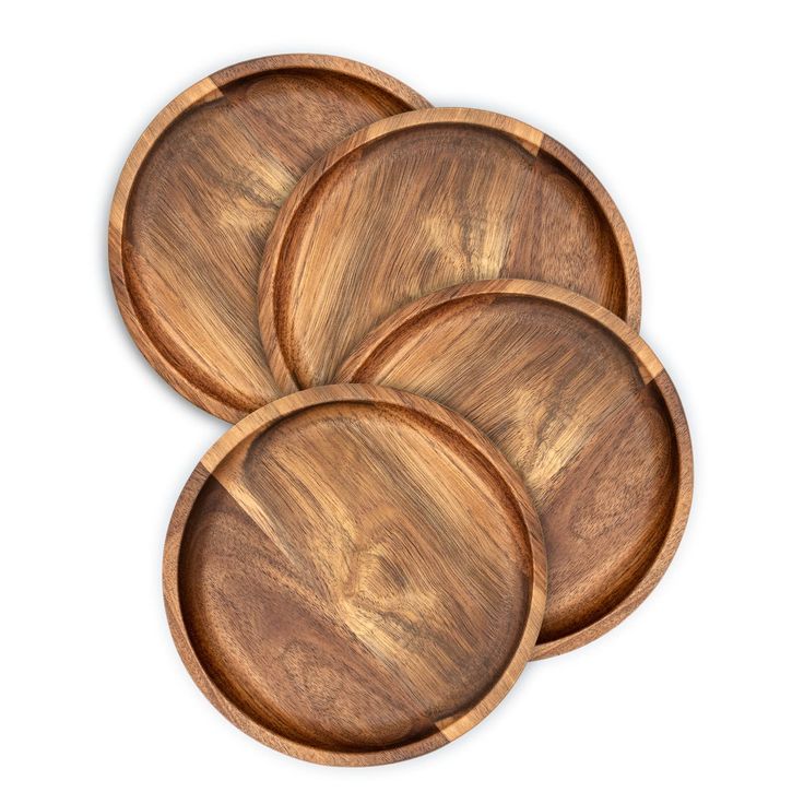 three wooden plates sitting on top of each other