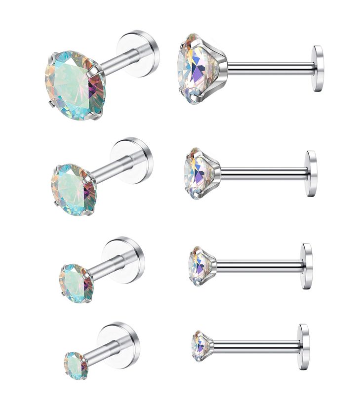 six pairs of surgical piercings with crystal stones