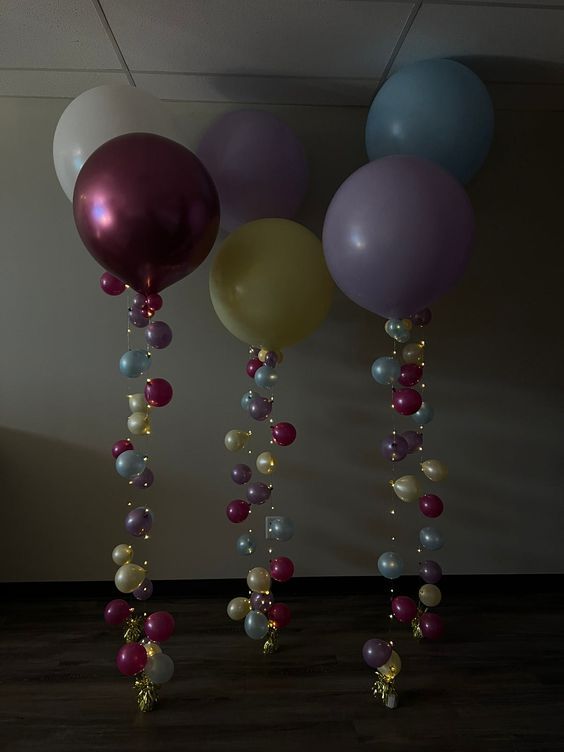 some balloons are hanging from the ceiling