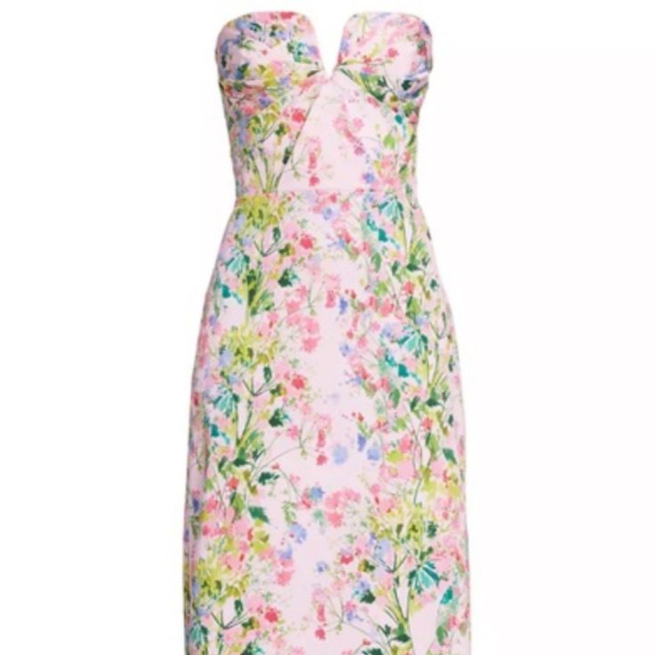 a women's dress with floral print on the front and side, in pink