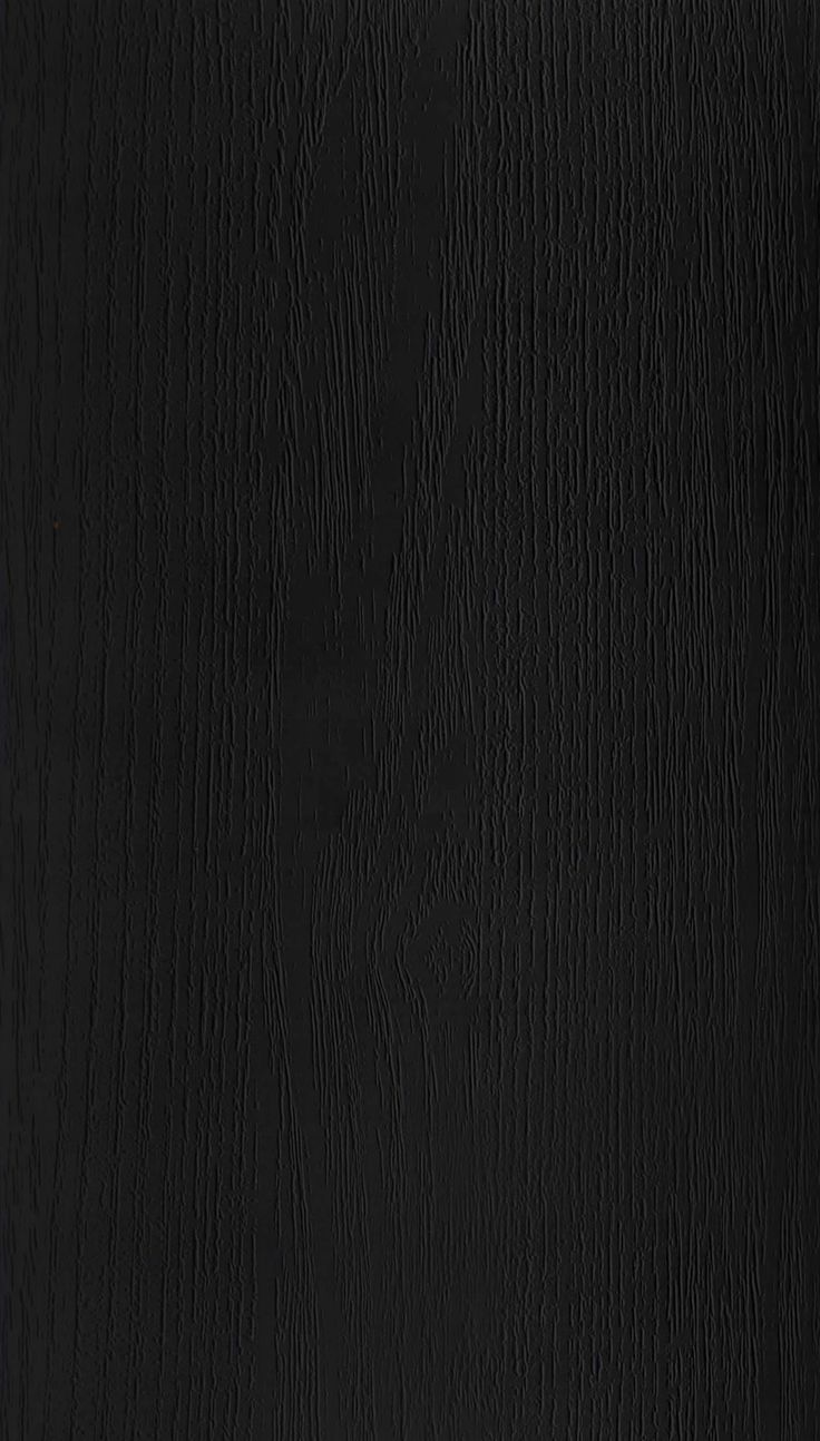 black wood grain textured background