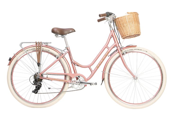 a pink bicycle with a basket on the front and back wheel, against a white background