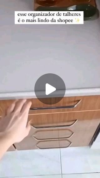 a person is opening the door to an oven with their hand on the stovetop