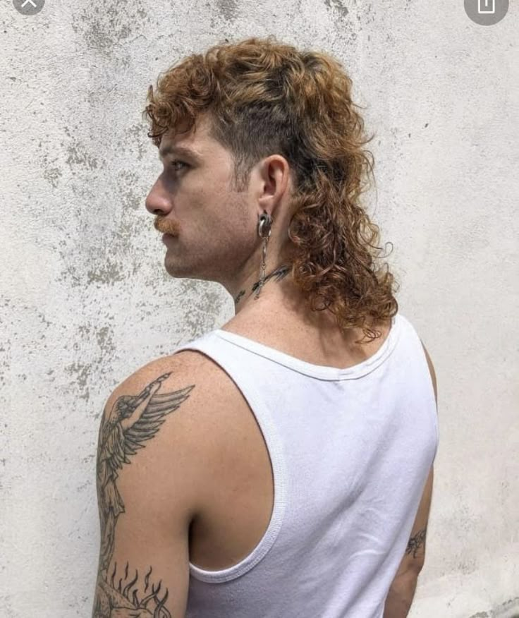 Long Curly Hair Men Shaved Sides, Australian Mullet Men, Mullet Boyfriend, 80s Mullet Guys, Mullet Hairstyle Mens Curly Long, Permed Mullet Men, Long Curly Mullet Men, Dyed Mullet Men, Mullet With Highlights