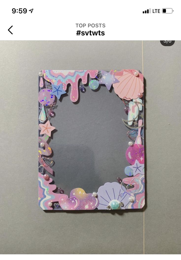 an image of a photo frame that is made out of paper and some other things