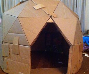 a cardboard house made to look like a tent