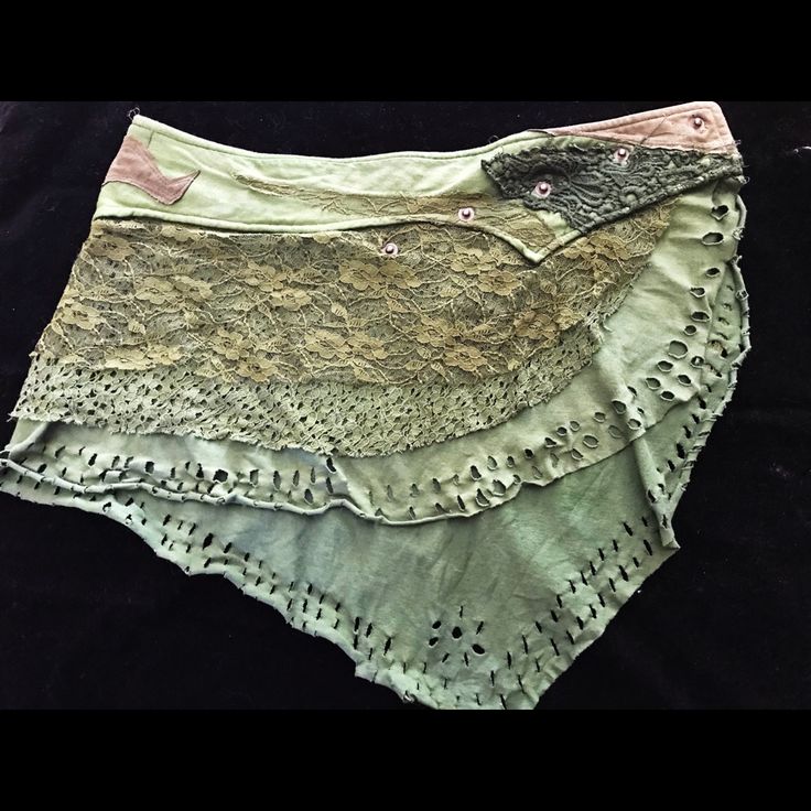 This Is A One Of A Kind, Brand New, Handmade Festival-Type Skirt. Made Of Green Lace And Cotton. As You Can See, It’s Gorgeous! Never Worn. No Stains Or Tears. It Adjustable With A Row Of Bottoms To To Fit To Your Size. Because Of This I Can’t Say What Specific Size It Is, But Could Fit A Medium Or Large Waist. It Is Missing One Button That Is Easily Replaceable. Boho Mini Skirt, Fitted Cotton Mini Skirt For Festivals, Hippie Style Fitted Wrap Skirt For Spring, Festival Skirt, Hippie Fitted Wrap Skirt For Spring, Fitted Hippie Wrap Skirt For Spring, Asymmetrical Green Skirt For Festival, Fitted Asymmetrical Green Skort, Fitted Patchwork Skirt For Festival