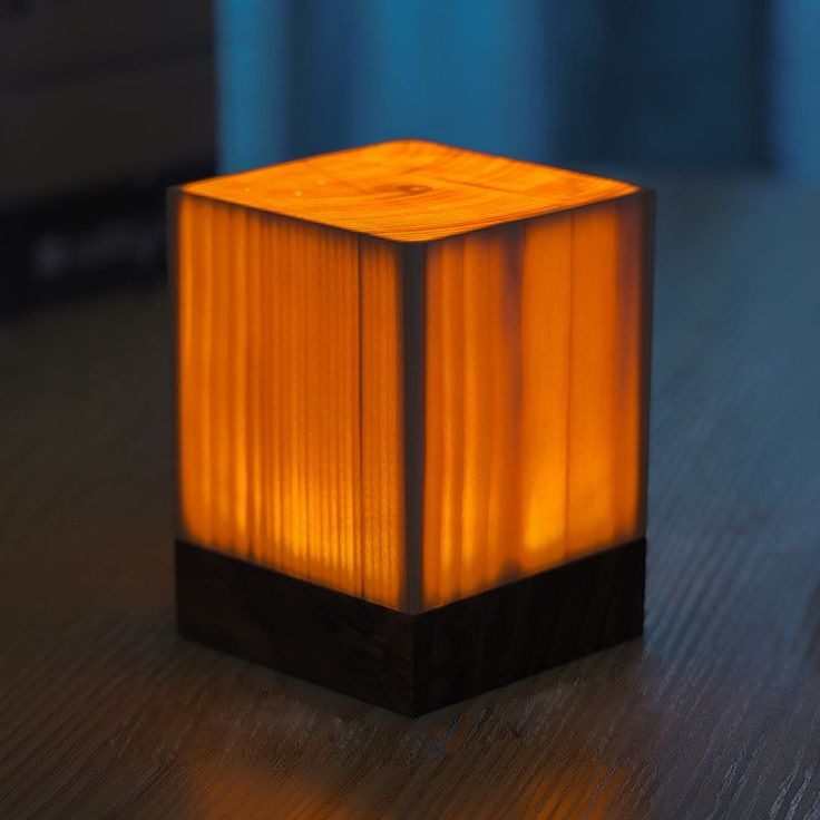 a small wooden block sitting on top of a table