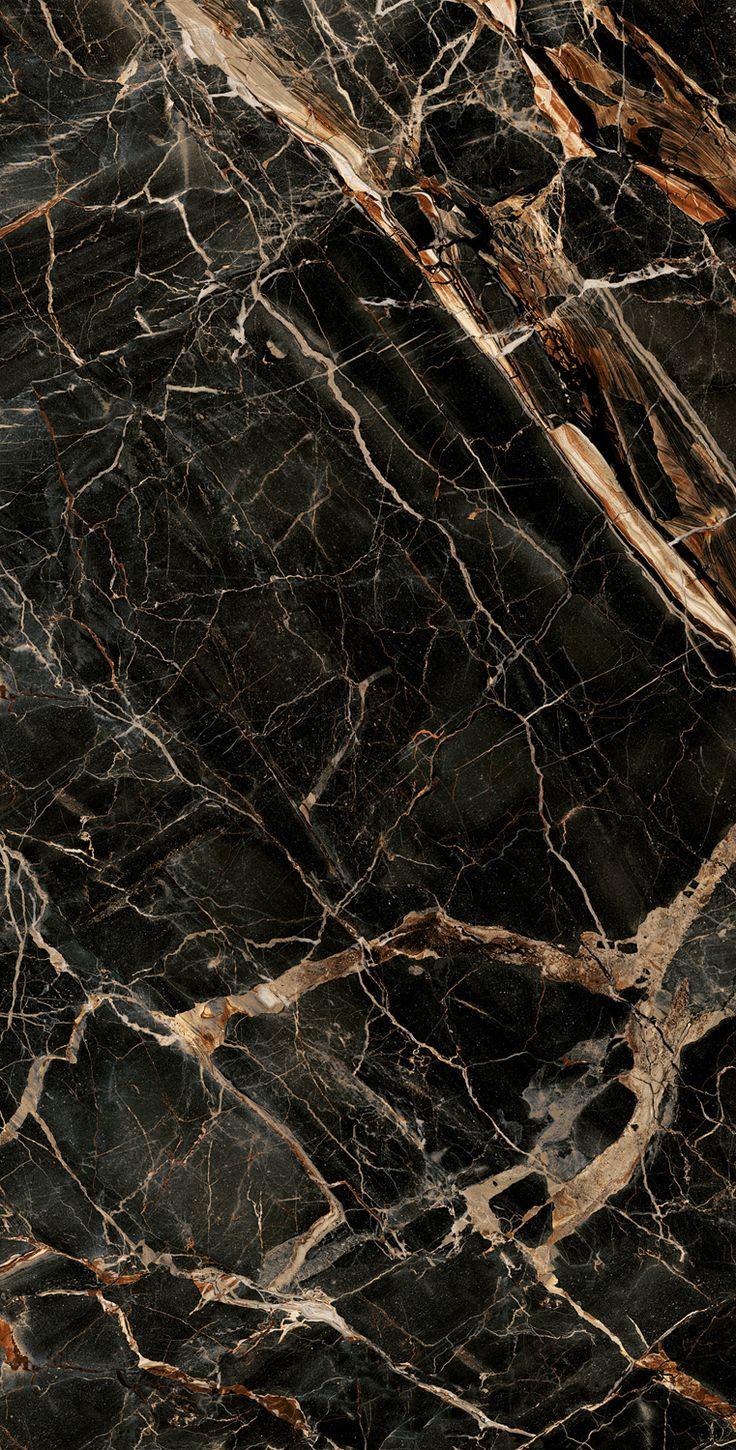 black marble textured with gold veining and dark brown streaks on the top right side