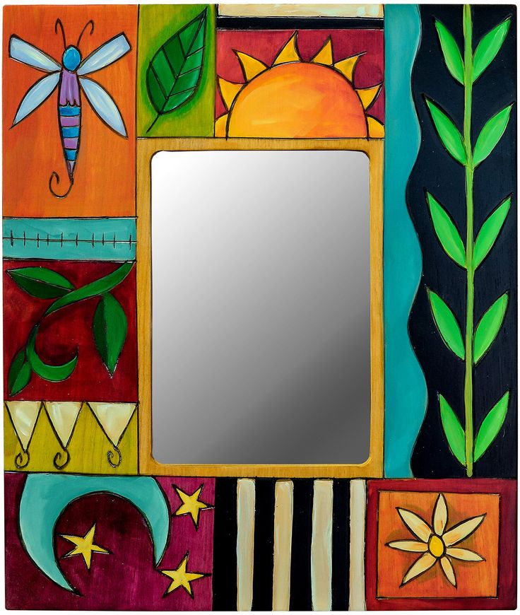 a mirror that is painted with different colors and designs on it's sides, in front of a black background