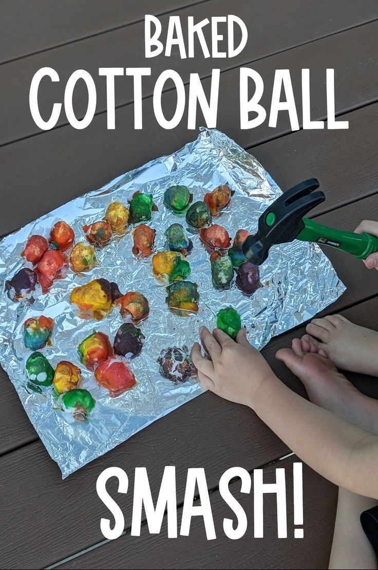 a child using scissors to cut gummy bears out of aluminum foil with the words cotton ball smash