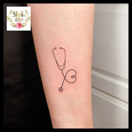 a tattoo with a stethoscope on the arm