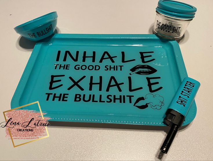 an inhale tray with some writing on it and a pen sitting next to it