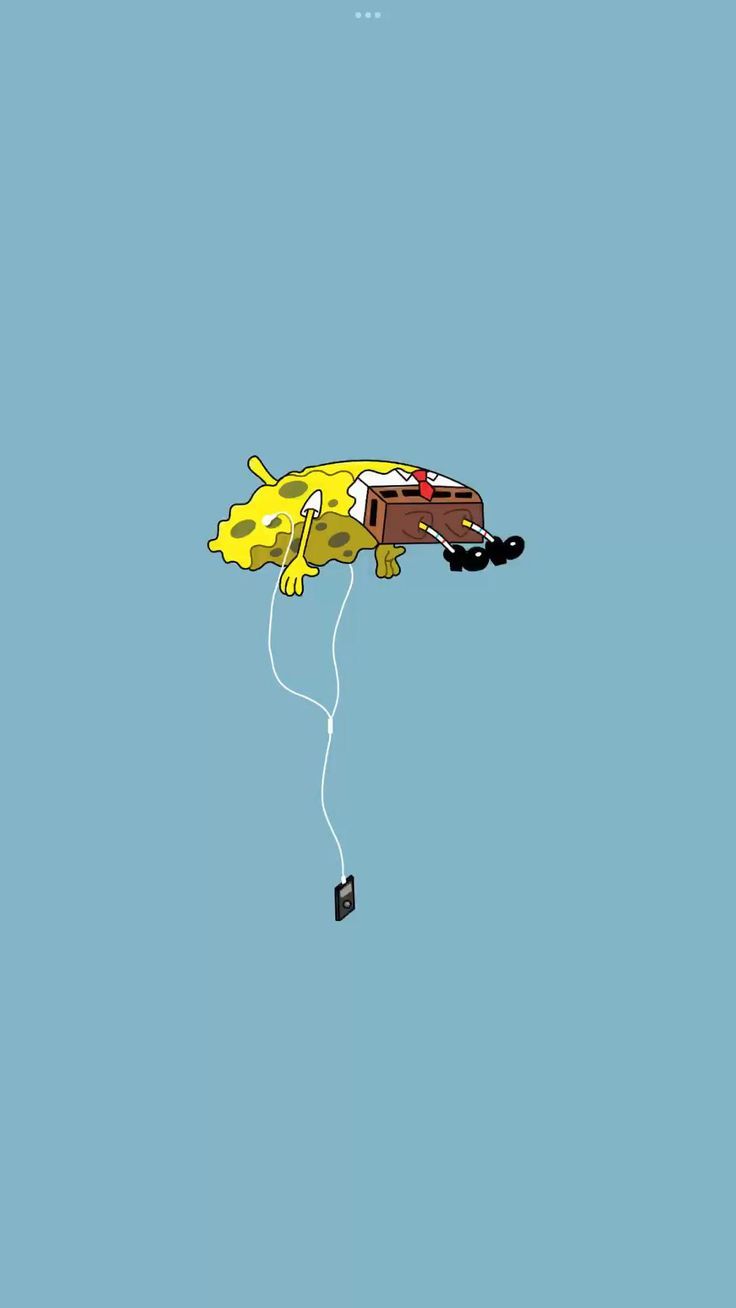 a yellow kite flying through the sky on a clear day with no one in it