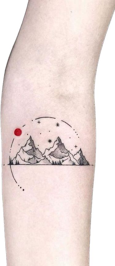 a small mountain tattoo on the right thigh with a red dot at the top and stars above it