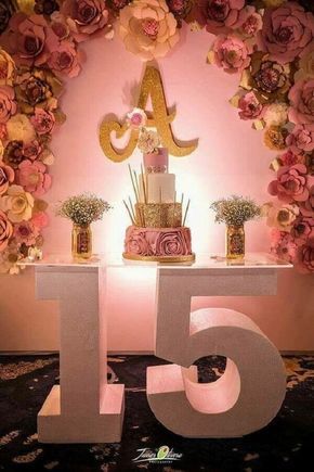 an image of a table with flowers on it and the number fifteen in front of it