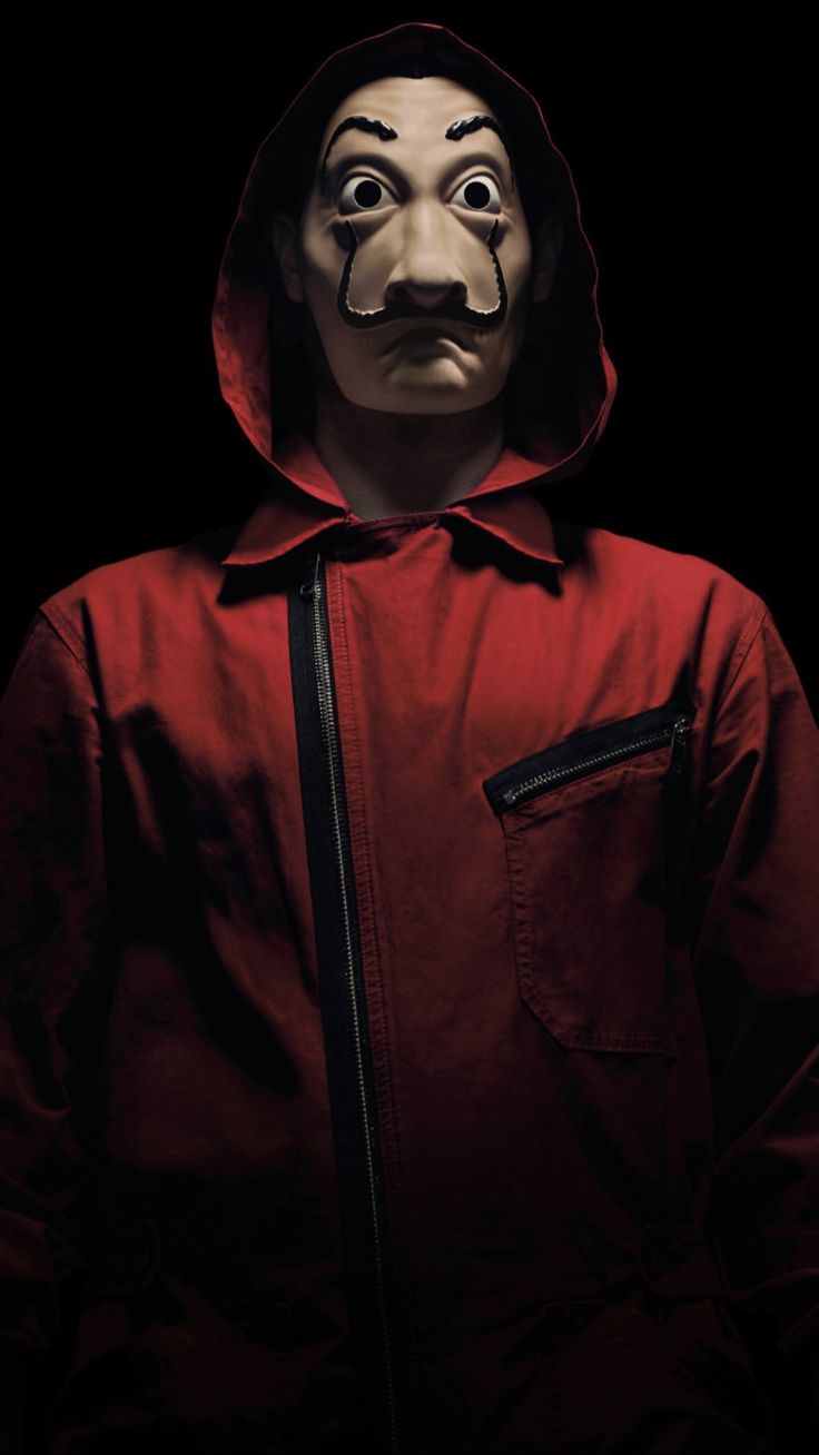 a man in a red jacket with a creepy mask on his face