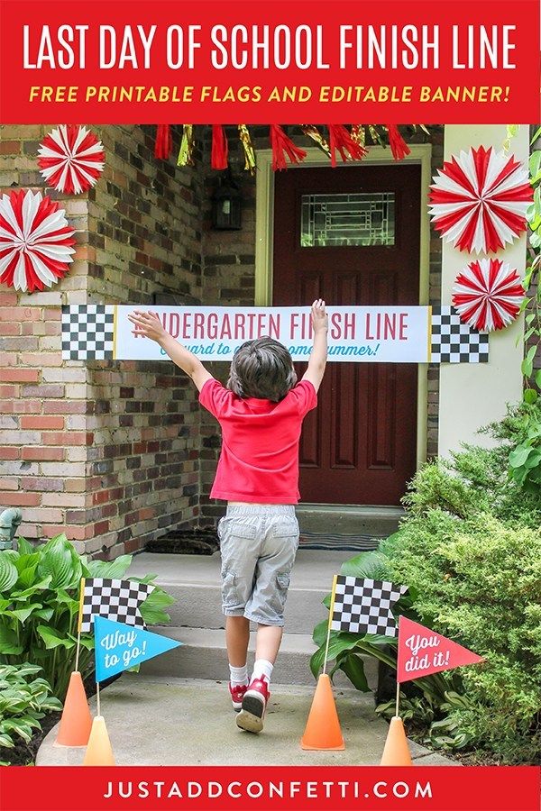 a young boy holding up a sign in front of a house that says, last day of school finish line free printable flags and edible banner