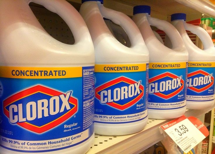 several gallon jugs of clorox liquid on a store shelf