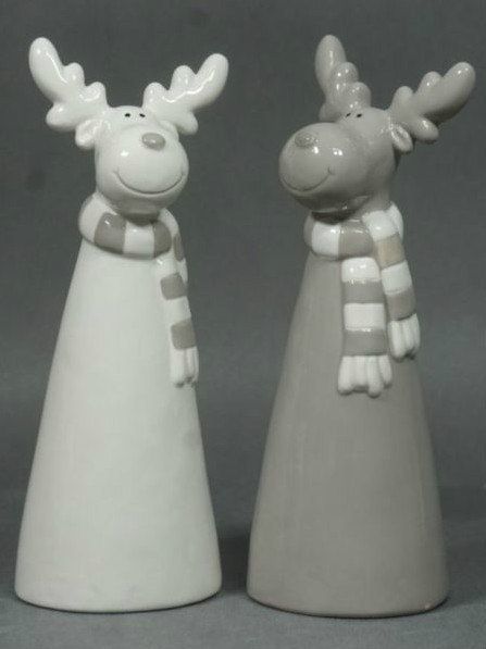 two ceramic figurines are standing next to each other on a gray background, one is wearing a scarf and the other has an antlers's head