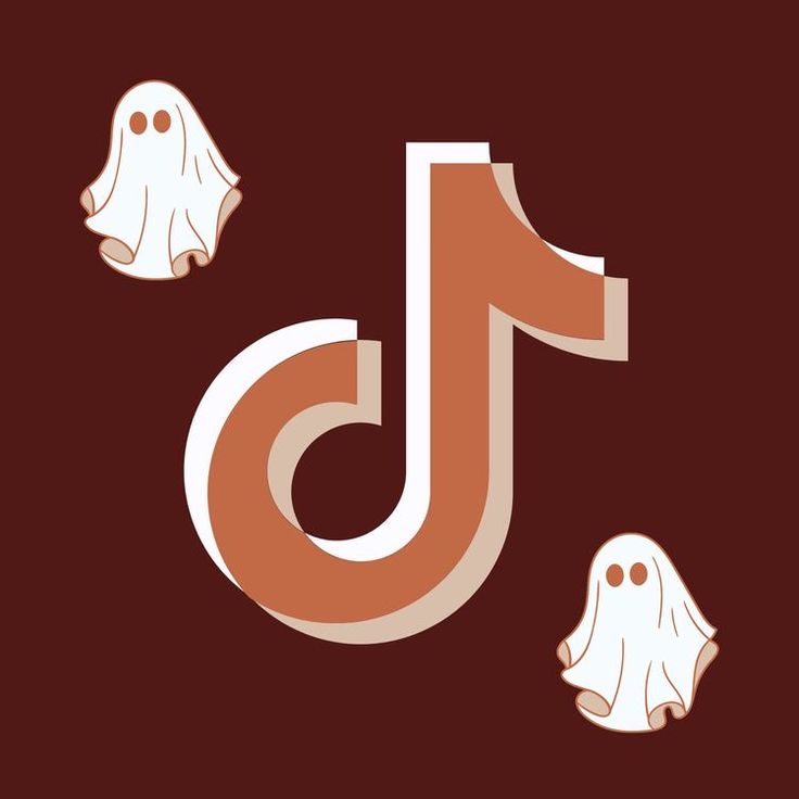 the letter j is for ghost and two ghost heads are in front of it on a brown background