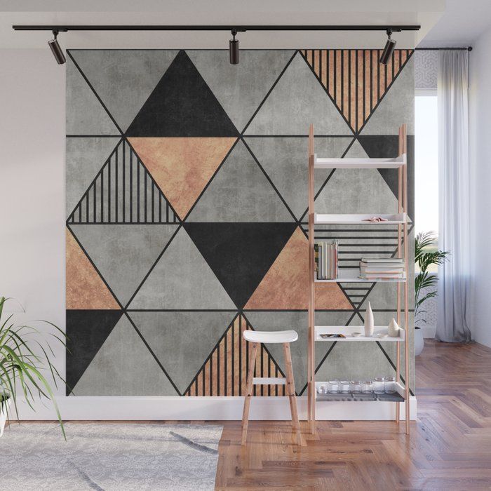 an abstract wall mural in grey and black