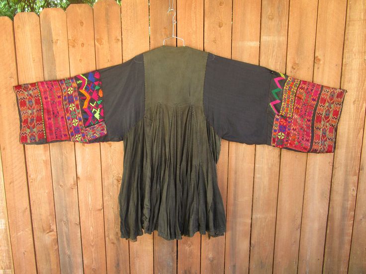 fabulous tribal dress BIG wonderful buttons - a few flaws but old and terrific 25 inches in chest - over 10 feet of twirl skirt - these are so fun to wear This is part of my collection of amazing wearable textile art. I was fortunate to be in Kabul for 3 days in 1980 as my plane broke down of the way from London to Delhi I purchased 3 huge bags of clothes and spent a week getting them dry cleaned and shipped by sea mail to USA - Then I traveled for 7 months all thru India and SE Asia I returned Bohemian Kurta For Rituals And Festivals, Bohemian Style Festival Kurta Tunic, Bohemian Festival Kurta Tunic, Bohemian Kurta With Traditional Patterns, Bohemian Kurta For Festivals, Bohemian Festival Kurta, Traditional Patchwork Kaftan For Festivals, Traditional Patchwork Festival Kaftan, Bohemian Kurta With Woven Motifs For Navratri